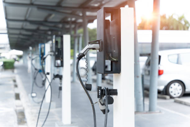Electric car charging station. Power supply for electric car charging. Clean energy concept stock photo