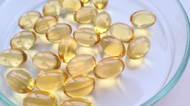 istock Omega 3 fatty acids capsules and vitamins closeup 1399677280