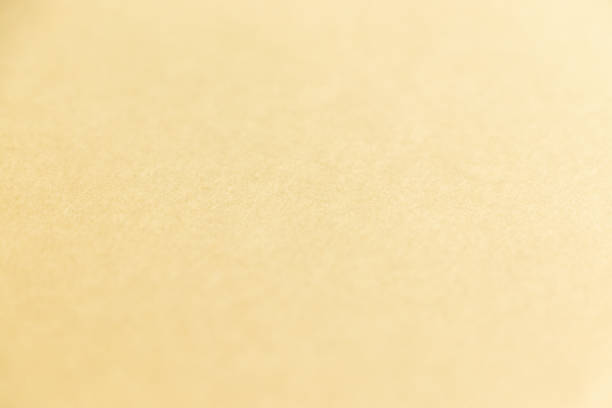 istock Texture of the surface of light cream-colored paper 1399679384