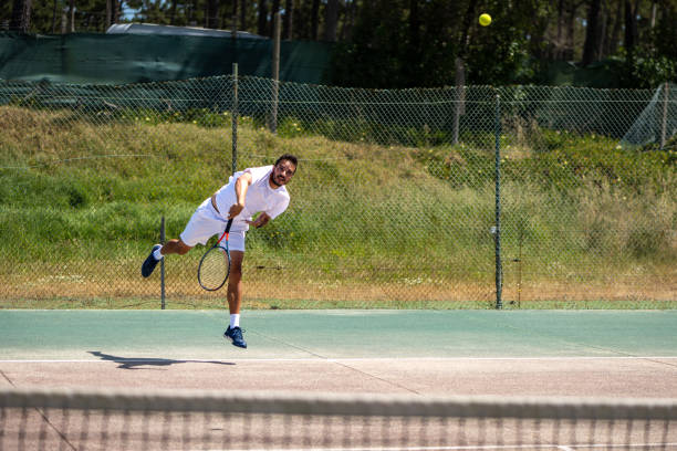 istock Tennis player performing a service 1399681317