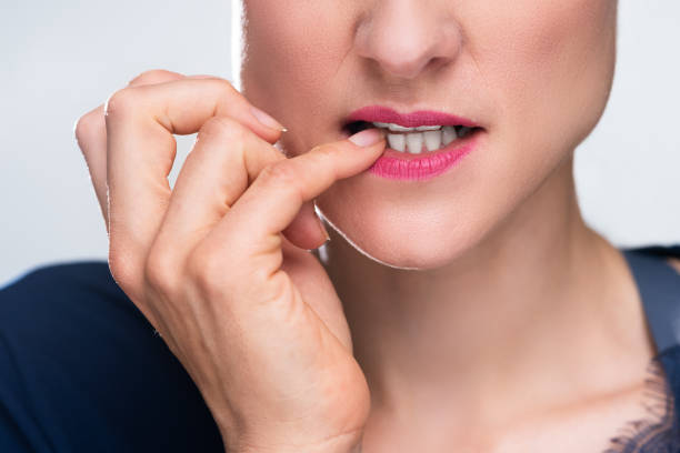 istock Businesswoman Biting Her Fingernail 1399683179