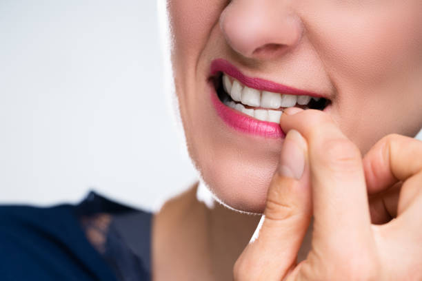 istock Businesswoman Biting Her Fingernail 1399683187