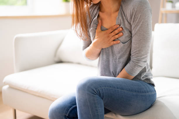 istock Woman Suffering From Chest Pain 1399683432