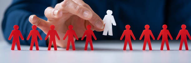 istock Businessperson Picking Red Human Figures 1399683514