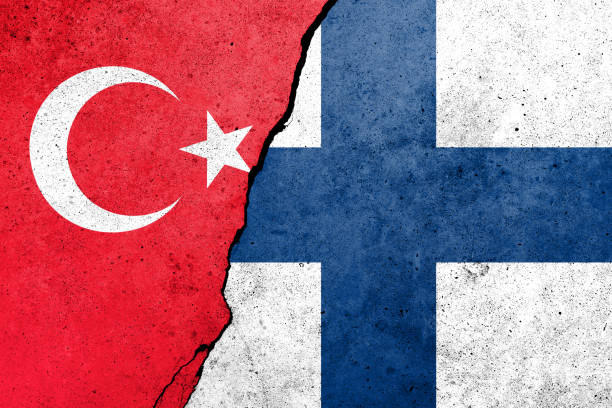 istock Turkey and Finland flags painted on the concrete wall 1399684510
