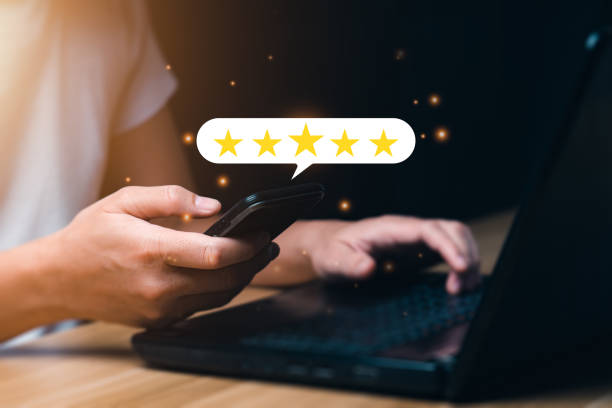 istock Customer satisfaction concept. Man hand using smartphone with five star pop-up icon for feedback. with copy space. 5 star satisfaction, Excellent business rating experience 1399684969