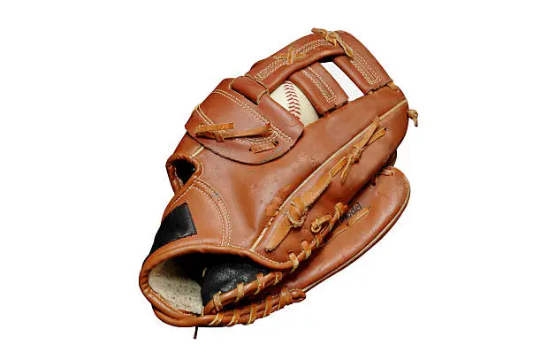 Baseball in glove.  Isolated image with clipping path.