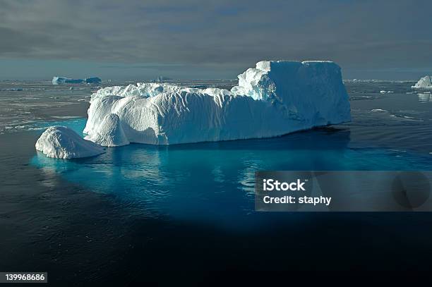 Antarctic Iceberg With Shimmering Underwater Ice Stock Photo - Download Image Now - Iceberg - Ice Formation, Photography, Weddell Sea