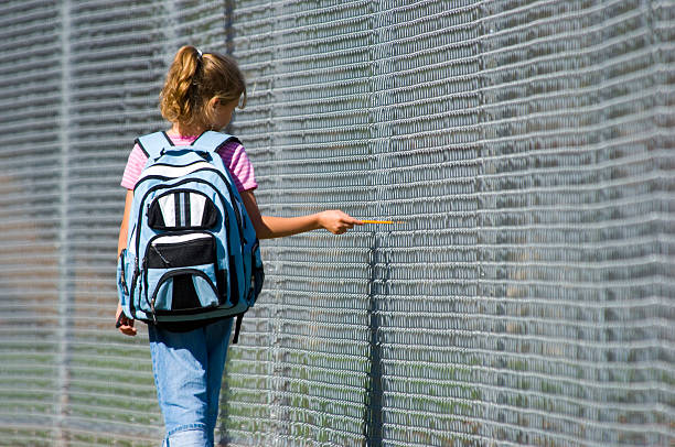 istock Little girl with backpack walking to school 139968987