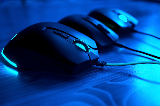 Led Lighting Gaming Mice In Blue Atmosphere