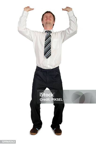 Businessman Pushing Upwards Stock Photo - Download Image Now - Businessman, Emotional Stress, Heavy