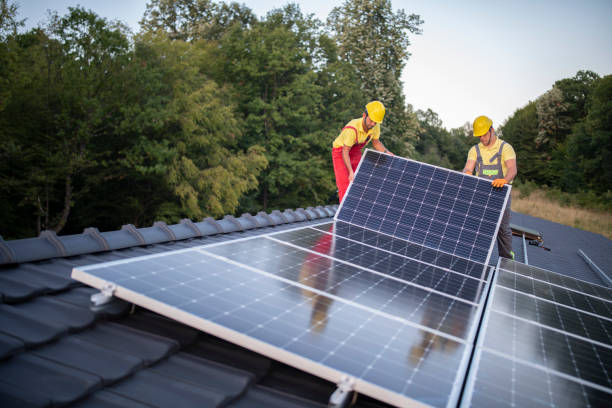 istock Installation of solar panels on a roof. 1399694336