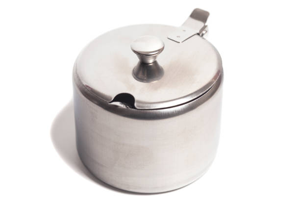istock Metal jar container isolated on white background. Container for spices,tea, with spoon 1399695549