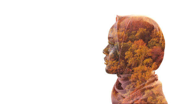 istock nature silhouette fall melancholy woman leaves 1399695620