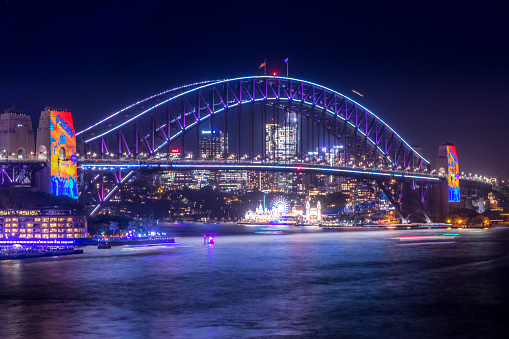 2022-05-28 - Circular Quay, NSW, Australia. This photo shows the Sydney Harbour Bridge during the 2022 Vivid Sydney Festival. It is the first day of the event, after being cancelled for two years due to COVID19.