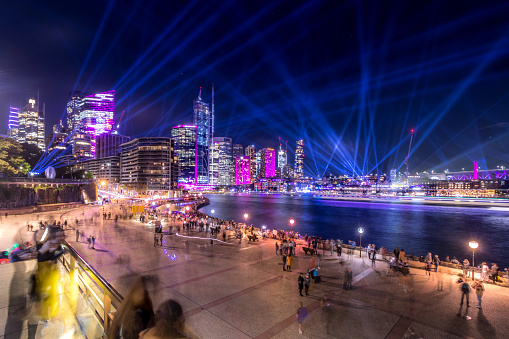 2022-05-28 - Circular Quay, NSW, Australia. This photo shows the buildings in Circular Quay during the 2022 Vivid Sydney Festival. It is the first day of the event, after being cancelled for two years due to COVID19.