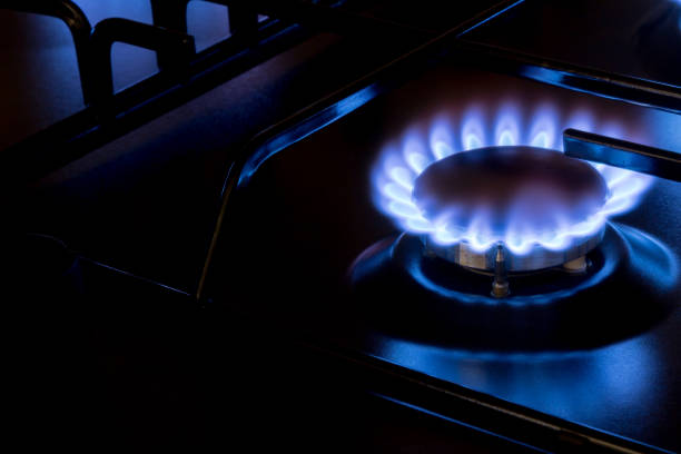 istock Gas burner with burnig methane on dark background 1399699203