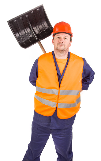 A worker holds a black shovel for snow removal. Isolated on a white background. Close-up.
