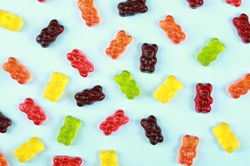 Colorful gummy jelly bears flat lay