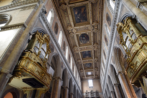 The Naples Cathedral (Duomo di Napoli) is a Roman Catholic cathedral, the main church of Naples. The image shows the ceiling of the main nave with its beautiful decorations.
