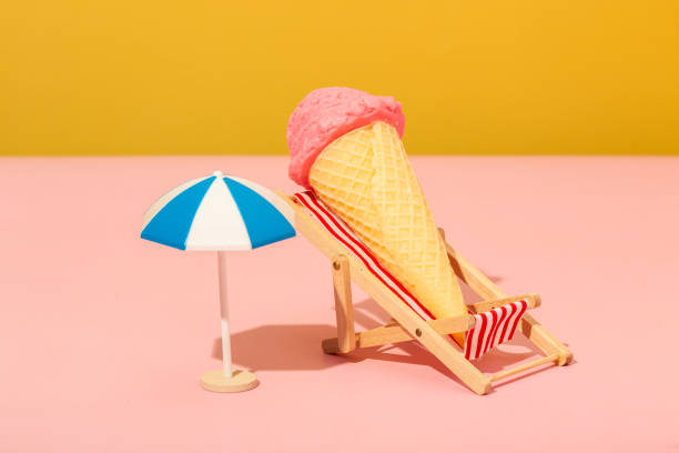 istock Ice cream in a hammock on a colored background, relaxation concept 1399701660