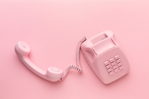 vintage phone on color background. High quality photo