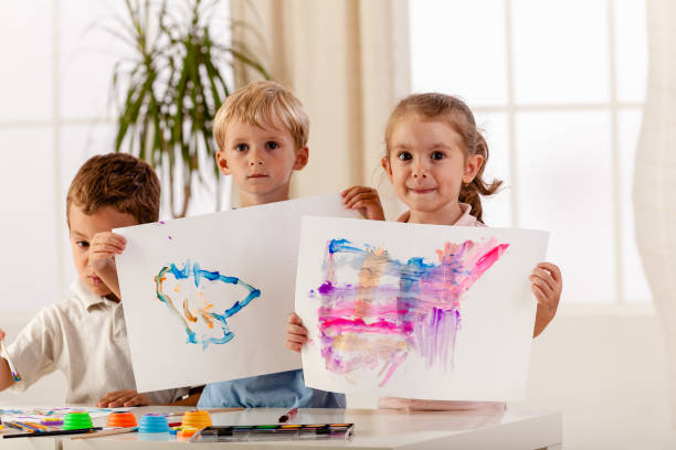 istock Little artist showing their drawing 1399703139