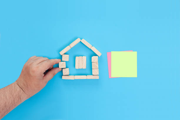 istock A small house made of wooden blocks 1399704510