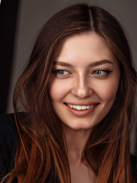 istock woman  with a big whitening teeth smile. 1399708190