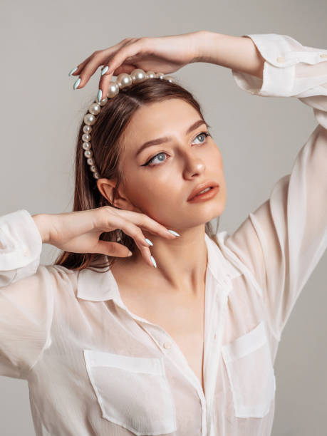 istock Beautiful young woman posing and looking away 1399708452