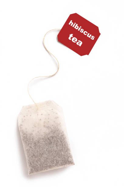istock hibiscus tea bag isolated on white. 1399709504