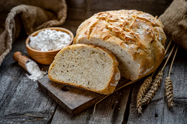 istock Fresh homemade bread on a wooden table 1399709694