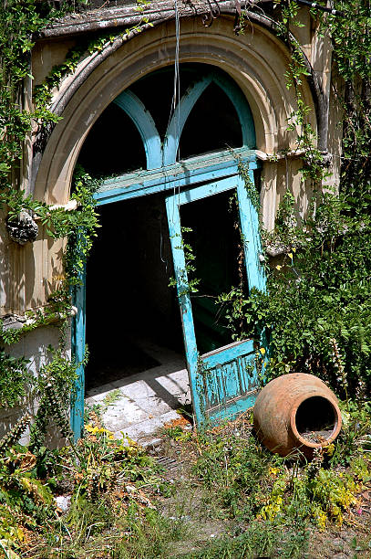 Doorway To Abandoned Building In Taormina stock photo