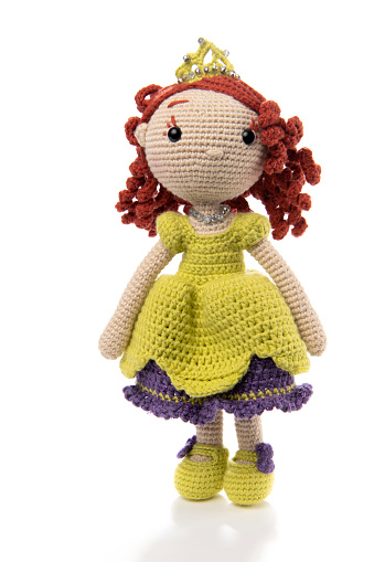 Amigurumi crochet doll isolated on white background