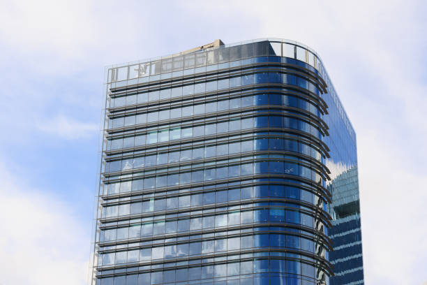 istock Part of a city building with cloudy sky 1399725114