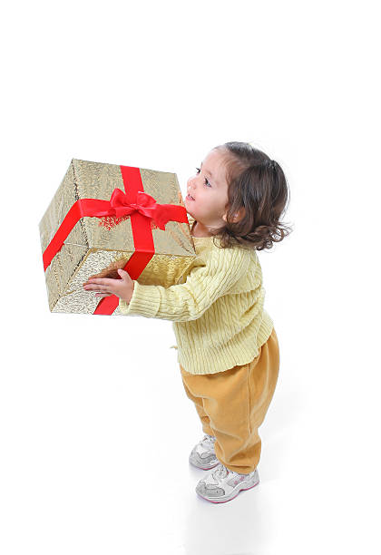 istock Toddler with a christmas gift 139972570