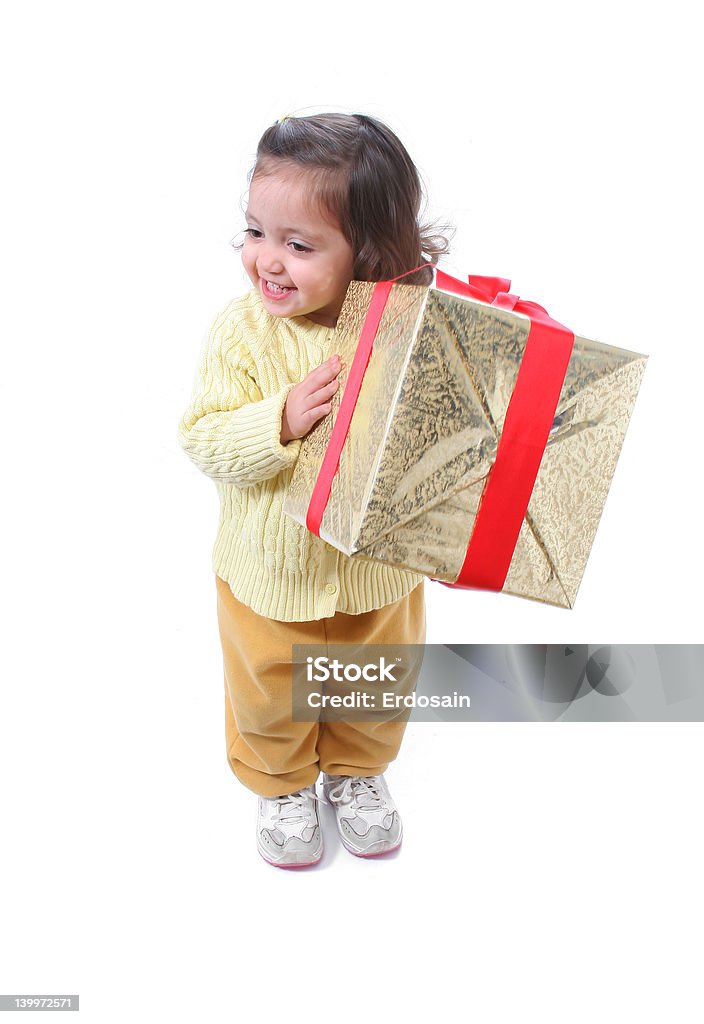 Niño pequeño con un regalo de navidad - Foto de stock de Alegre libre de derechos