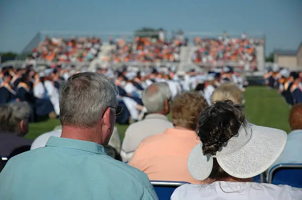 Shot of a croud looking over an event, shallow focus only on crowd.