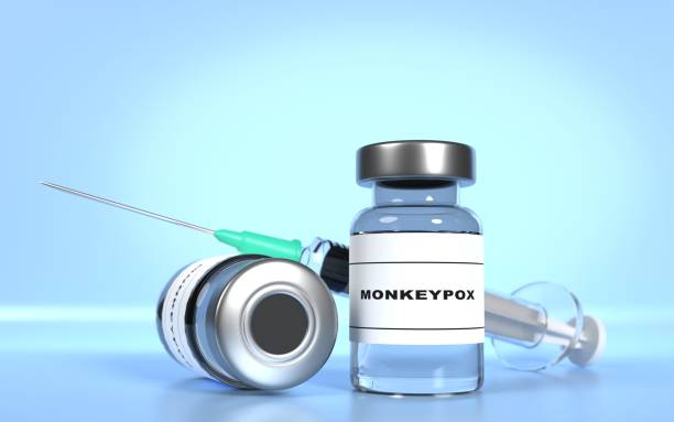 istock Monkeypox Vaccine with Syringe Against Blue Background 1399726513