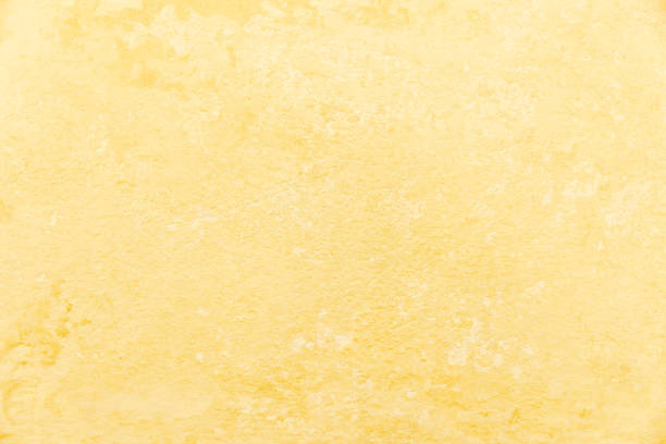 istock Pastel Yellow Marble Stone Concrete Cement Texture Background 1399726583