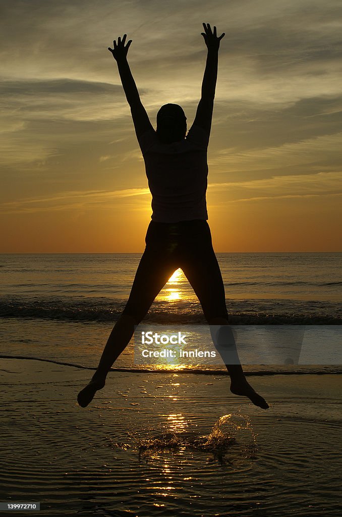 Feliz al atardecer - Foto de stock de Actividad libre de derechos