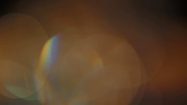 Multicolored light leaks footage on black background, lens flare leak burst overlays transitions