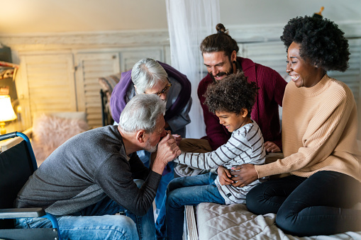 Portrait of multiethnic happy multi-generation family spending time together. People love concept