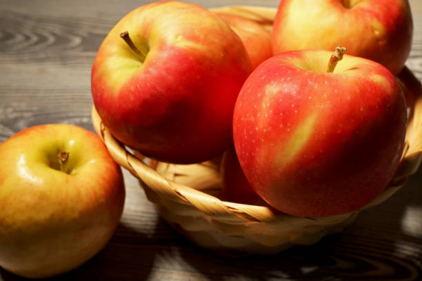 istock red apples in a wicker basket 1399737840