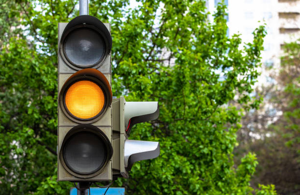 istock Traffic lights. Yellow lamp 1399737885