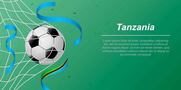 Soccer background with flying ribbons in colors of the flag of Tanzania Soccer background with flying ribbons in colors of the flag of Tanzania. Realistic soccer ball in goal net. lineup stock illustrations