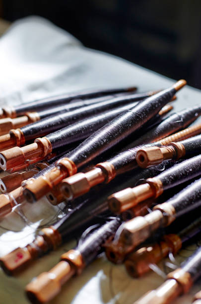 istock Spindles tool of silk thread for loom, close up, selective focus. Traditional weaving yarn. 1399740844
