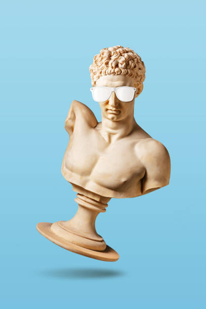istock Creative concept with old statue in sunglasses on light blue background. Minimal party concept. 1399742982