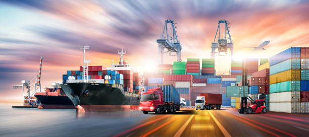 istock Logistics Transportation of Container Cargo Freight Ship during loading at industrial port dock yard by crane, Truck Transport red blue containers on highway, cargo airplane, handlers, Global Business 1399746622