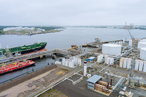 Aerial view transportation crude oil tanker oil storage tank terminal petrol industrial zone